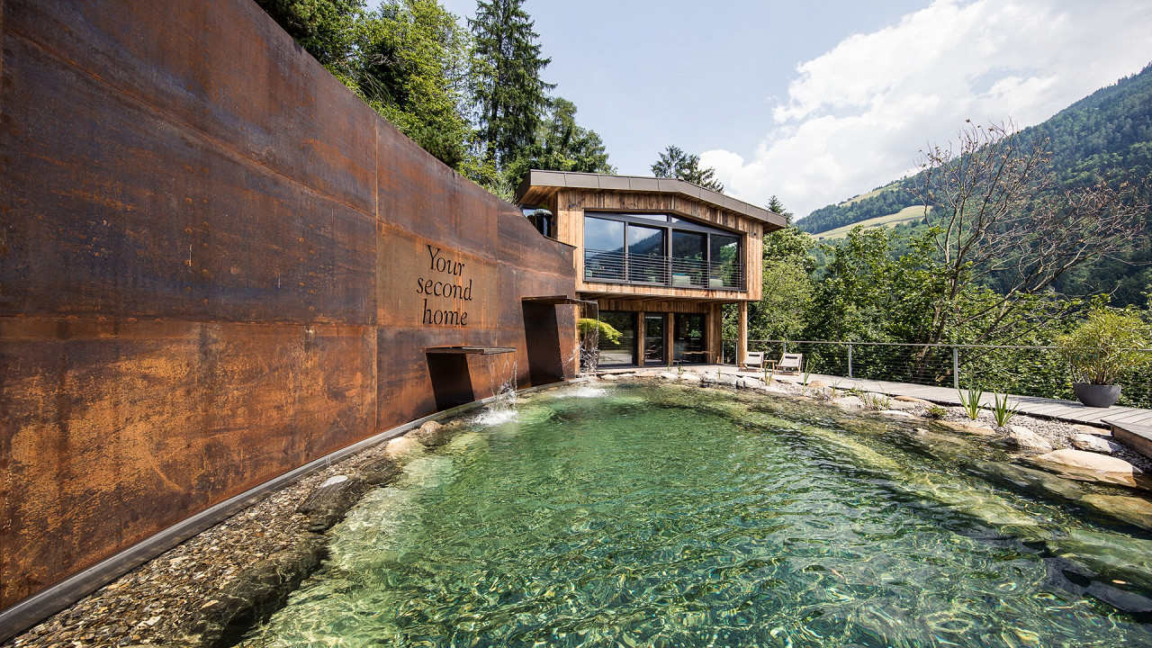 Bathing lake Quellenhof Luxury Resort Passeier