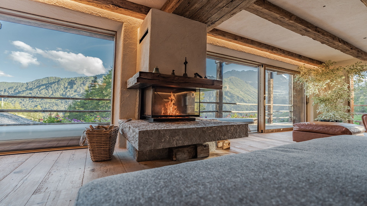 Living room with fireplace Cesa del Louf Arabba