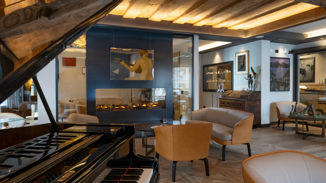 Salle de séjour avec piano Locanda degli Artisti Canazei
