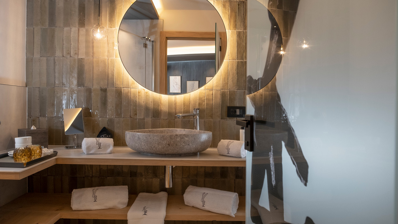 Miroir dans la salle de bains Locanda degli Artisti Canazei