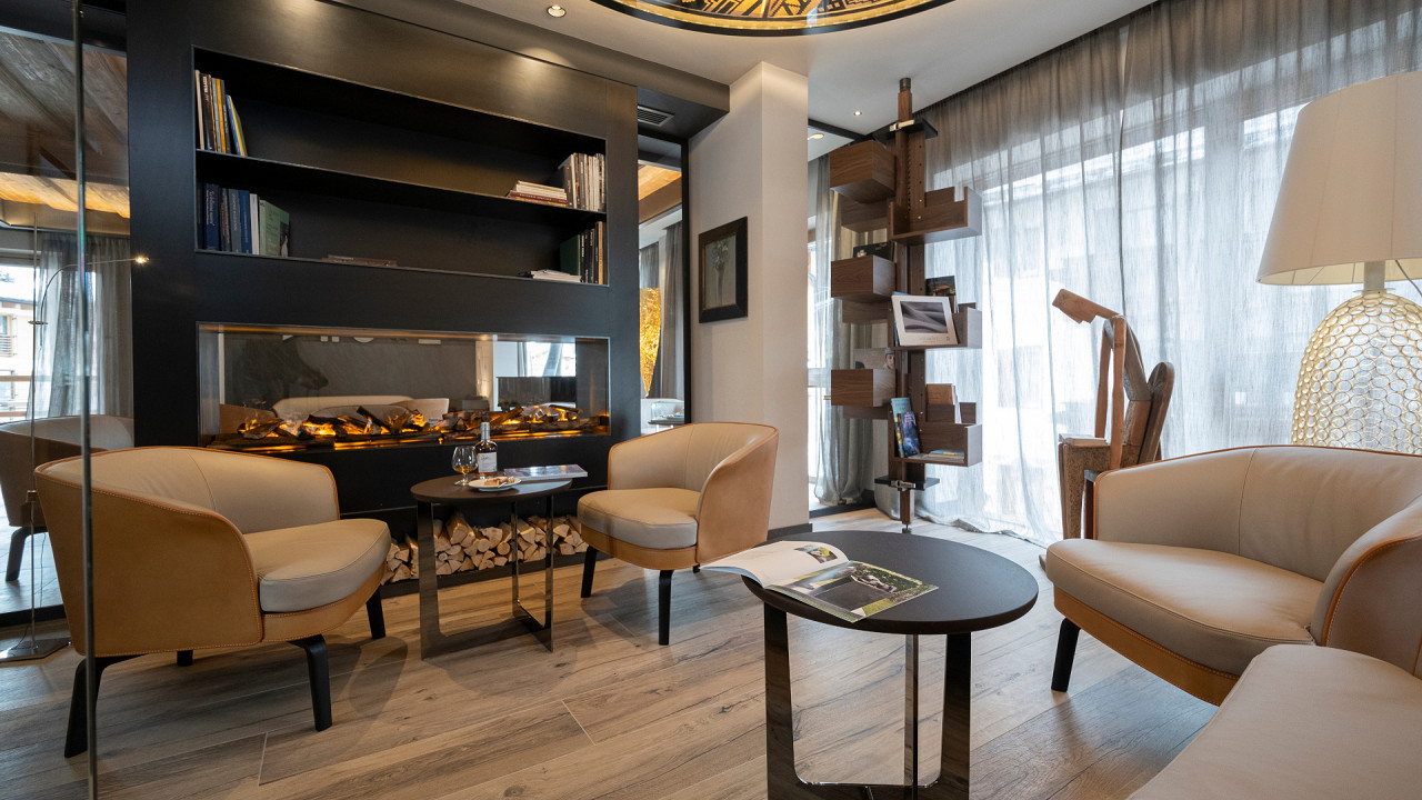 Salle de séjour avec cheminée Locanda degli Artisti Canazei