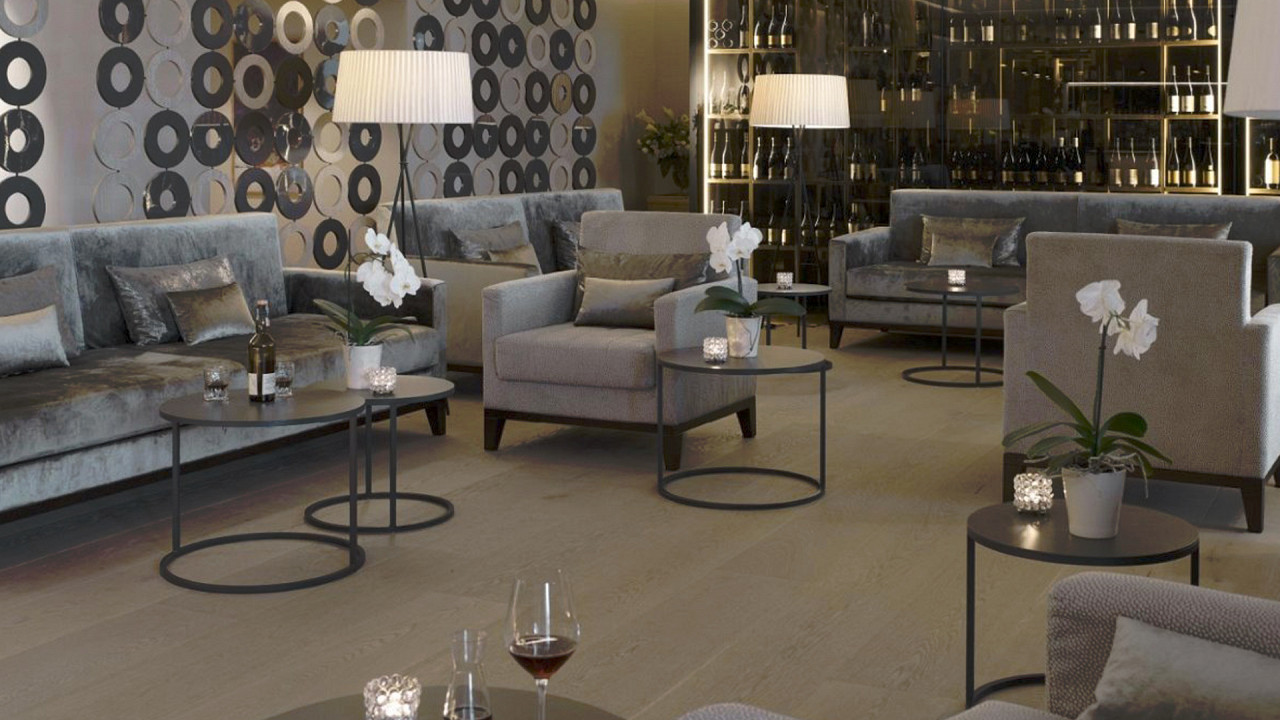 Lounge con divani e tavoli Hotel Giardino Marling